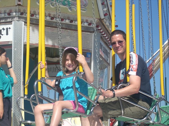 Jessica and Jim on Swings